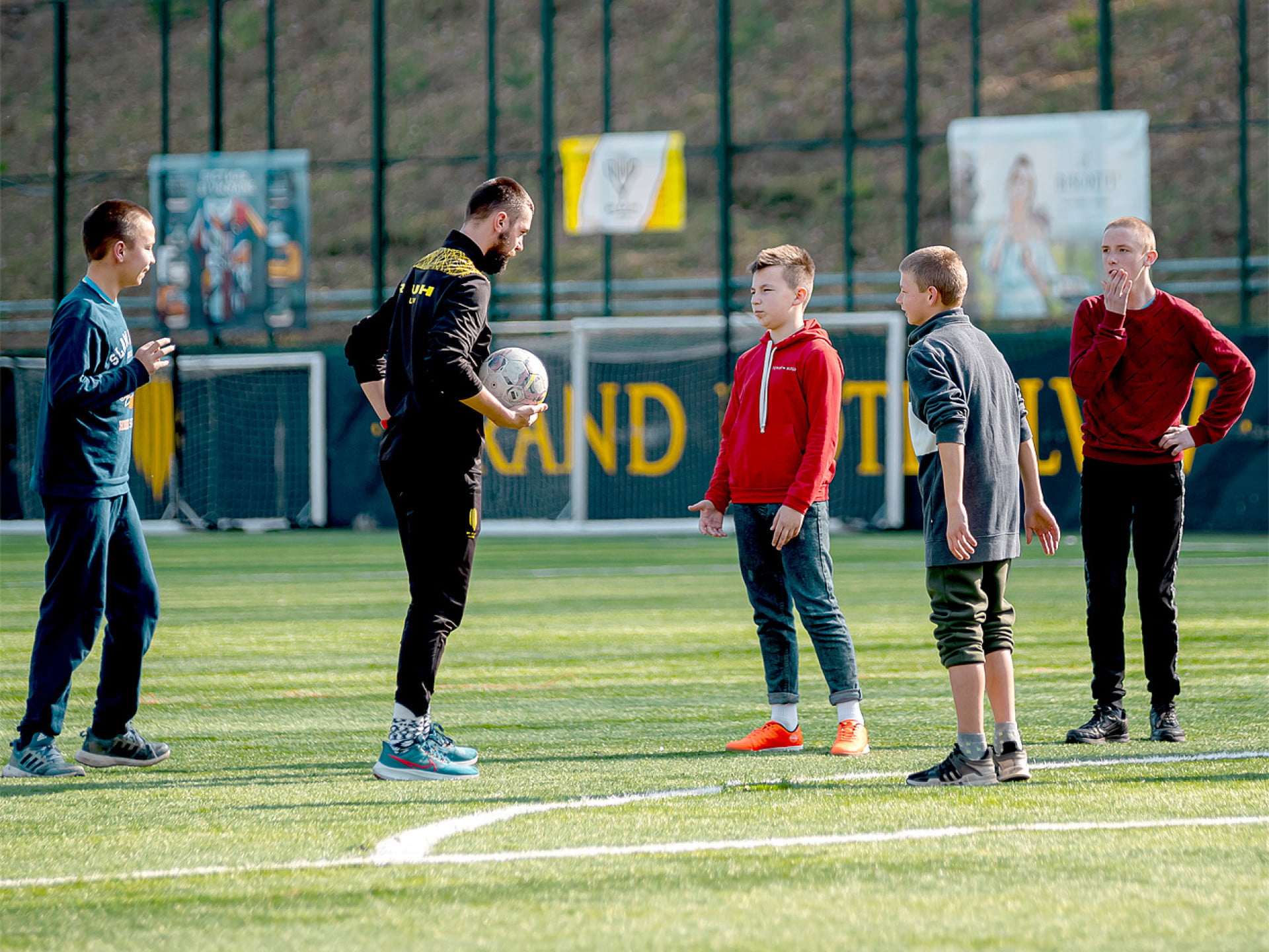 Coaches of the Ruh Football Academy taught young players and played football with them